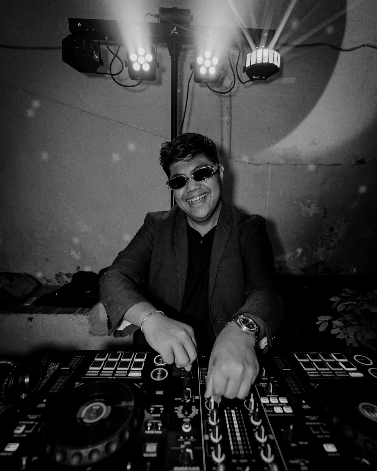 ELEVN DJ in the booth at a Barcelona wedding venue